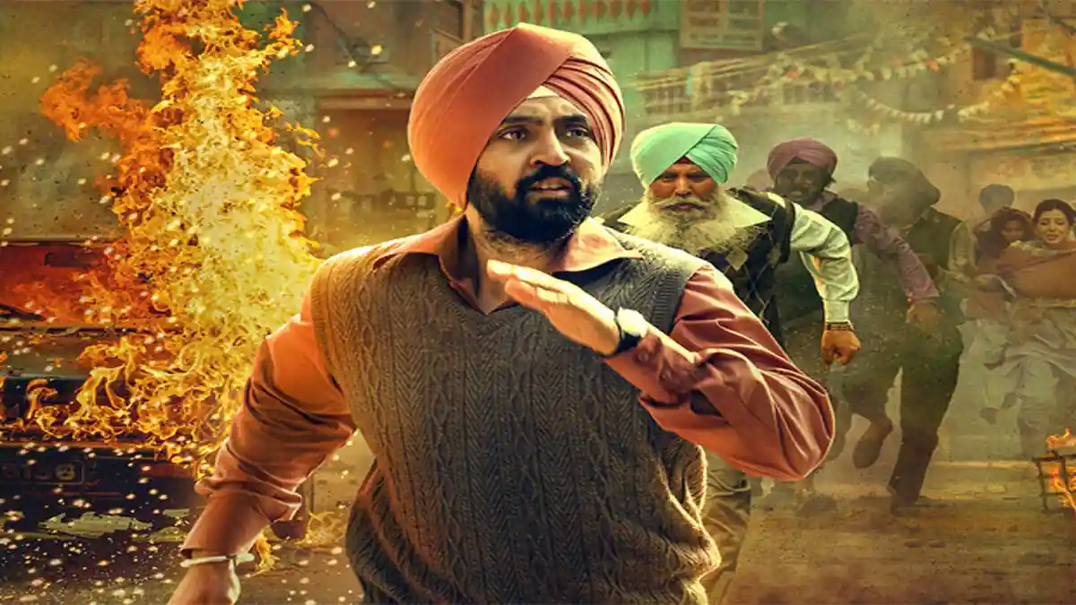 Diljit Dosanjh running through 1984 dange di agh, Sikh bravery te fear da expression face te.