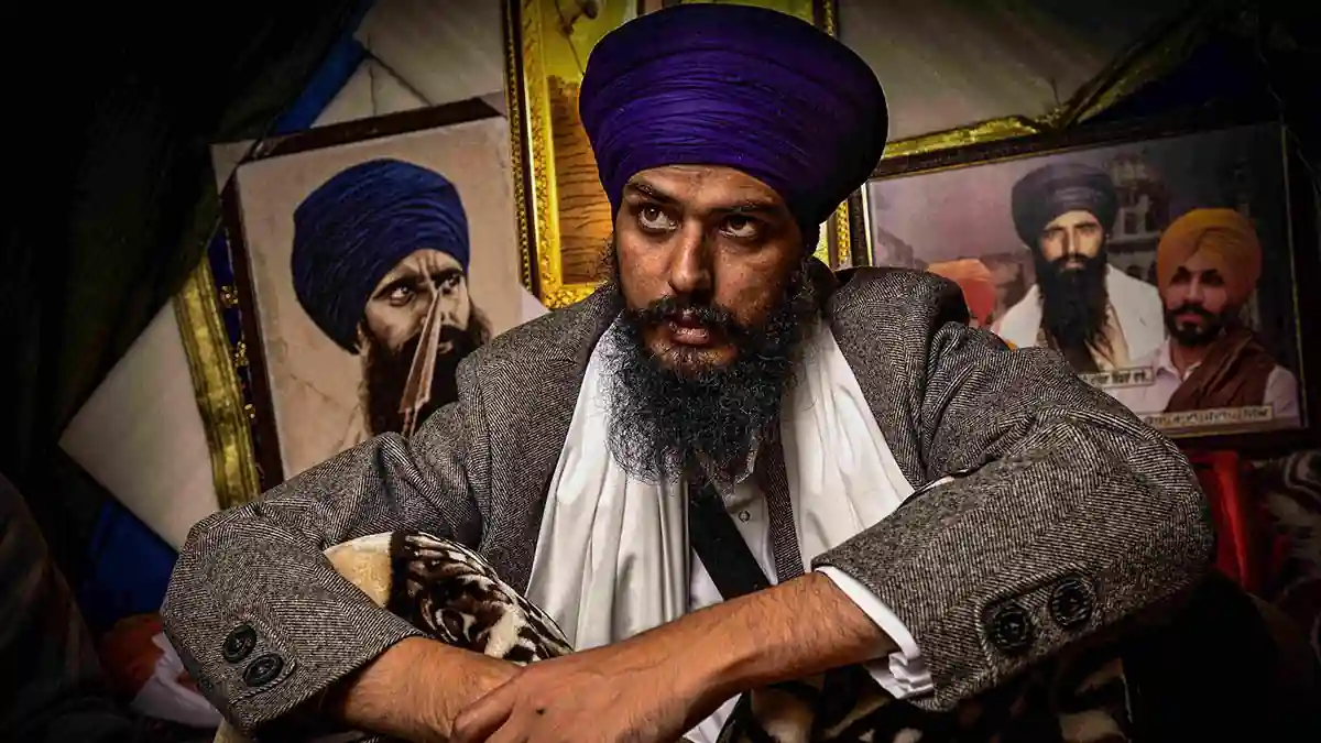 Amritpal Singh with folded hands during a religious event.