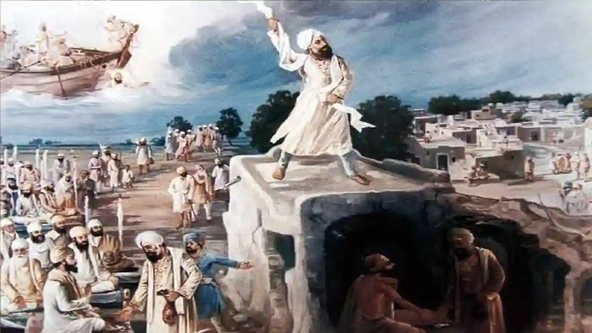 Baba Makhan Shah Lubana Ji raising arm on rooftop
