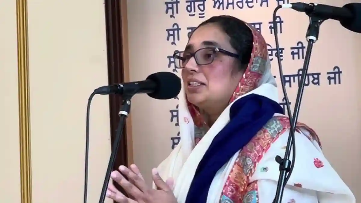 Navkiran Kaur Khalra speaking at a public event.