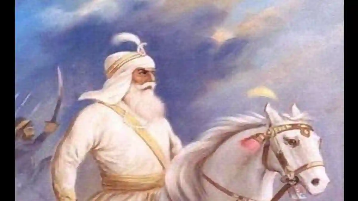 Sham Singh Attariwala Ji on horseback with white beard and turban